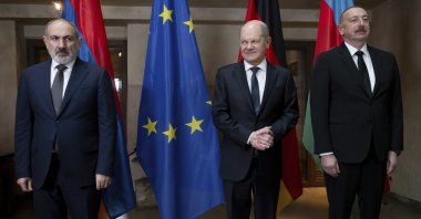 Armenian Prime Minister Nikol Pashinyan (L), German Chancellor Olaf Scholz (C) and Azerbaijani President Ilham Aliyev (R) line up for a photo during a meeting as part of the Munich Security Conference, Munich, Germany, Feb. 17, 2024. (AP Photo)