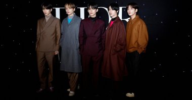 K-pop stars are now among the most highly anticipated celebrities attending fashion week shows, and often draw the loudest cheers from fans waiting outside, Paris, France, Jan. 19, 2024. (Reuters Photo)
