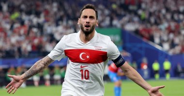Türkiye's Hakan Çalhanoğlu celebrates after scoring the opening goal during the UEFA EURO 2024 group F match between Czechia and Türkiye, Hamburg, Germany, June 26, 2024. (EPA Photo)