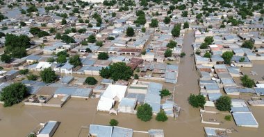 This aerial view shows houses submerged under water in Maiduguri on Sept.10, 2024. (AFP Photo)