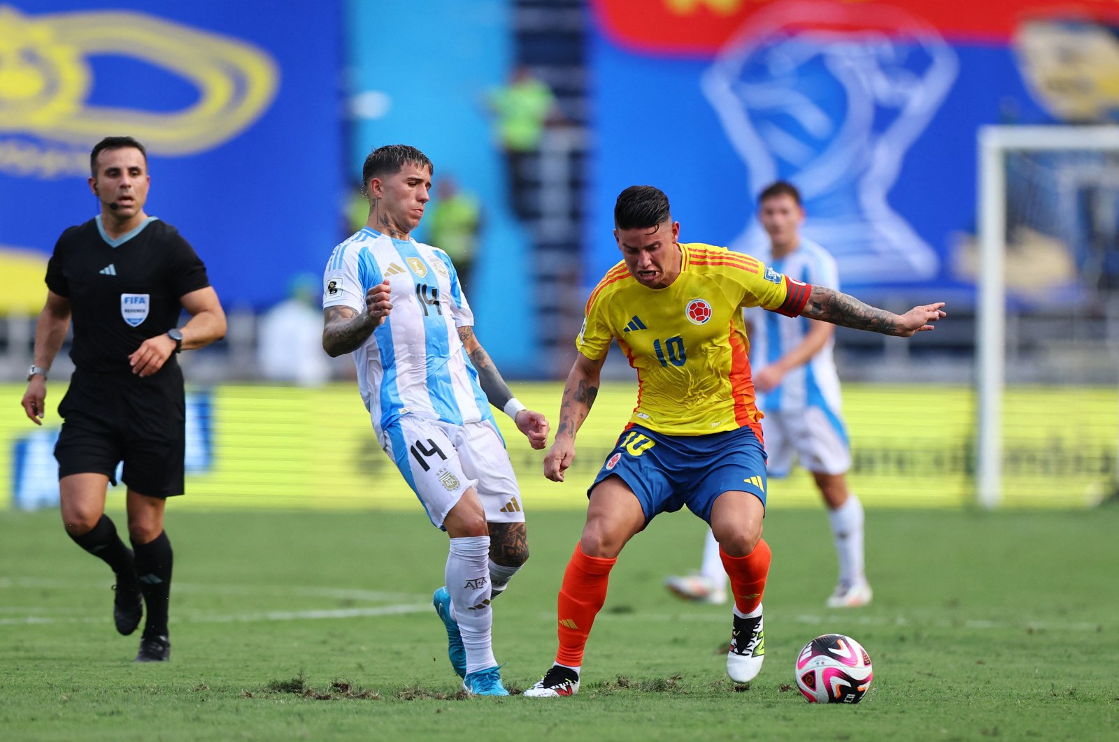 Colombia&#039;s James Rodriguez (R) in action with Argentina&#039;s Enzo Fernandez during the World Cup&#039;s South American Qualifiers match at the Estadio Metropolitano, Barranquilla, Colombia, Sept. 10, 2024. (Reuters Photo) 