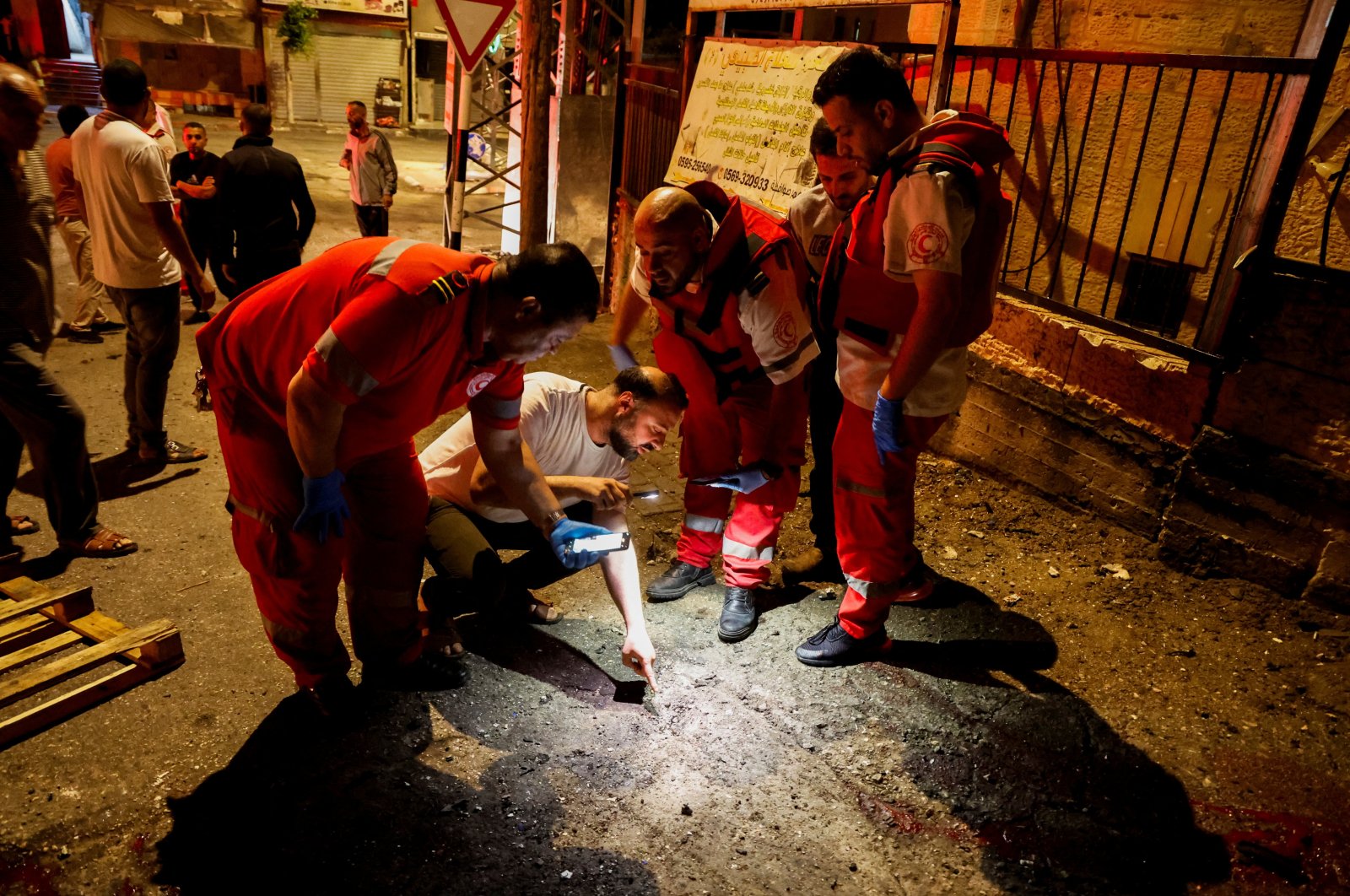 People assess the site of Israeli strikes where several Palestinians were killed, in Tubas, Israeli-occupied West Bank, Sept. 11, 2024. (Reuters Photo)