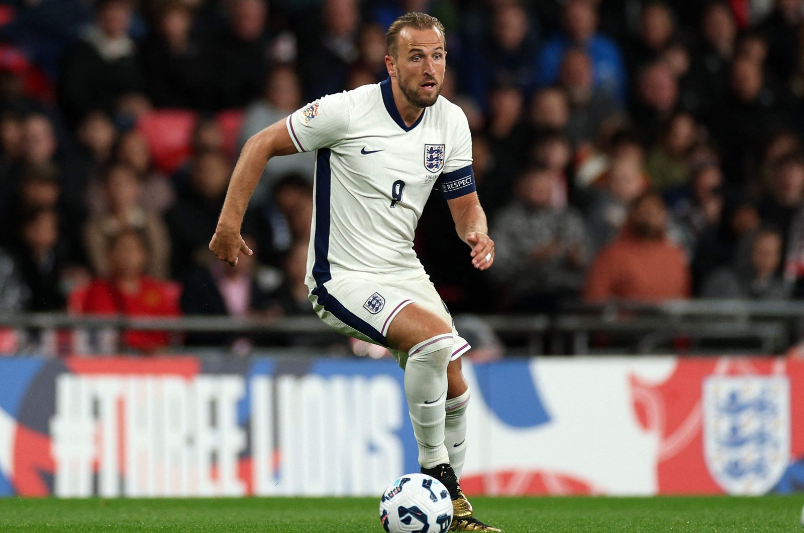 England&#039;s Harry Kane runs with the ball during their UEFA Nations League, League B - Group 2, first leg football match between England and Finland, Wembley Stadium, London, U.K., Sept. 10, 2024. (AFP Photo)