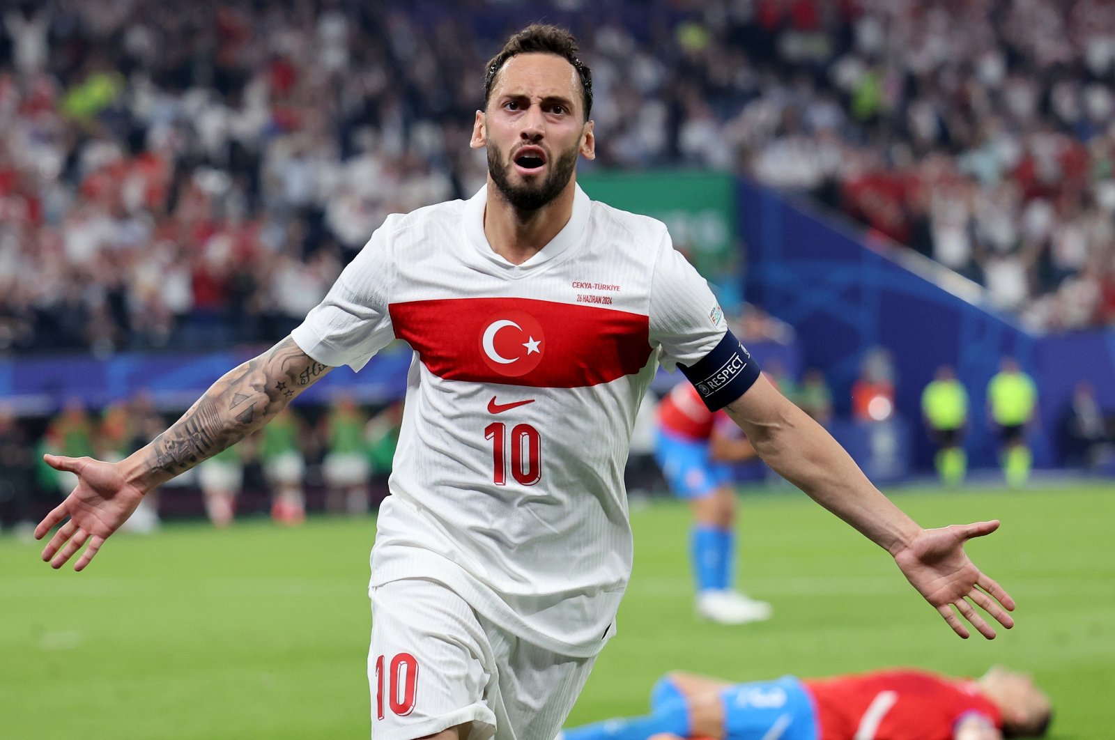 Türkiye&#039;s Hakan Çalhanoğlu celebrates after scoring the opening goal during the UEFA EURO 2024 group F match between Czechia and Türkiye, Hamburg, Germany, June 26, 2024. (EPA Photo)