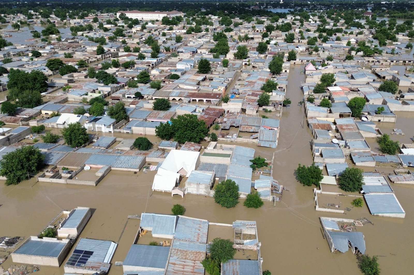 This aerial view shows houses submerged under water in Maiduguri on Sept.10, 2024. (AFP Photo)