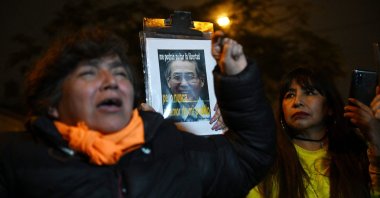 Supporters of former Peruvian President Alberto Fujimori shout slogans after his death in Lima, Peru, Sept. 11, 2024. (AFP Photo)