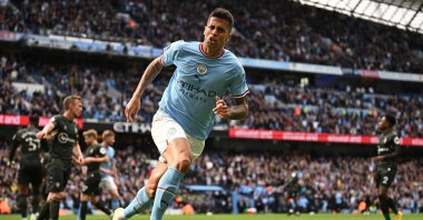 Joao Cancelo celebrates scoring the opening goal during the English Premier League football match between Manchester City and Southampton at the Etihad Stadium, Manchester, U.K., Oct. 8, 2022. (AFP Photo)