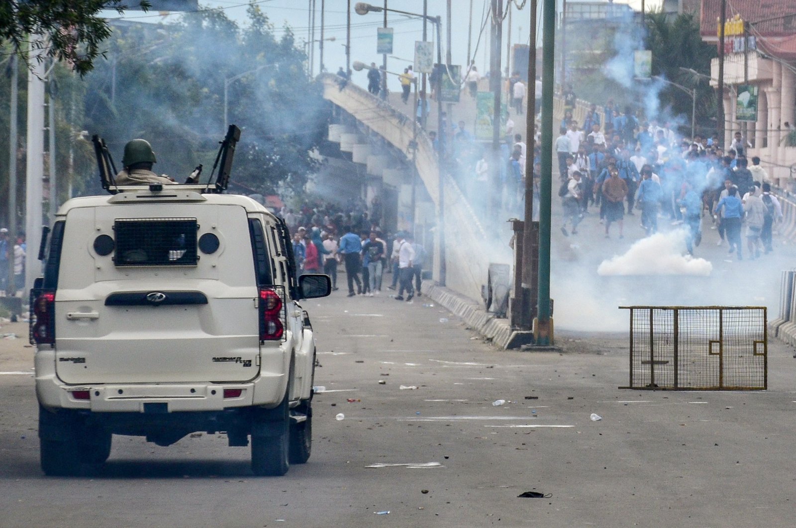 Security personnel fire tear gas shells to disperse protesters during a curfew in Imphal, Manipur, northeastern India, Sept. 10, 2024. (AFP Photo)