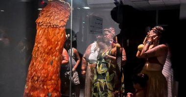 Members of the Tupinamba Indigenous people visit the Tupinamba cloak returned by the National Museum of Denmark at the Quinta de Boa Vista Park, Rio de Janeiro, Brazil, Sept. 11, 2024. (AFP Photo)