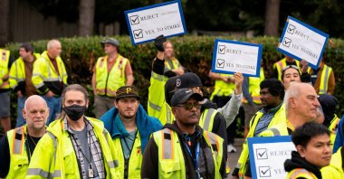Boeing factory workers hold signs as they wait to vote on their first full contract in 16 years at an International Association of Machinists and Aerospace Workers District 751 union hall in Renton, Washington, U.S. Sept. 12, 2024. (Reuters Photo)