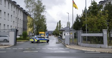 A police car drives on the grounds of the Upper Franconia barracks, in Hof, Germany in this undated photo. (Pia Bayer/dpa via AP)