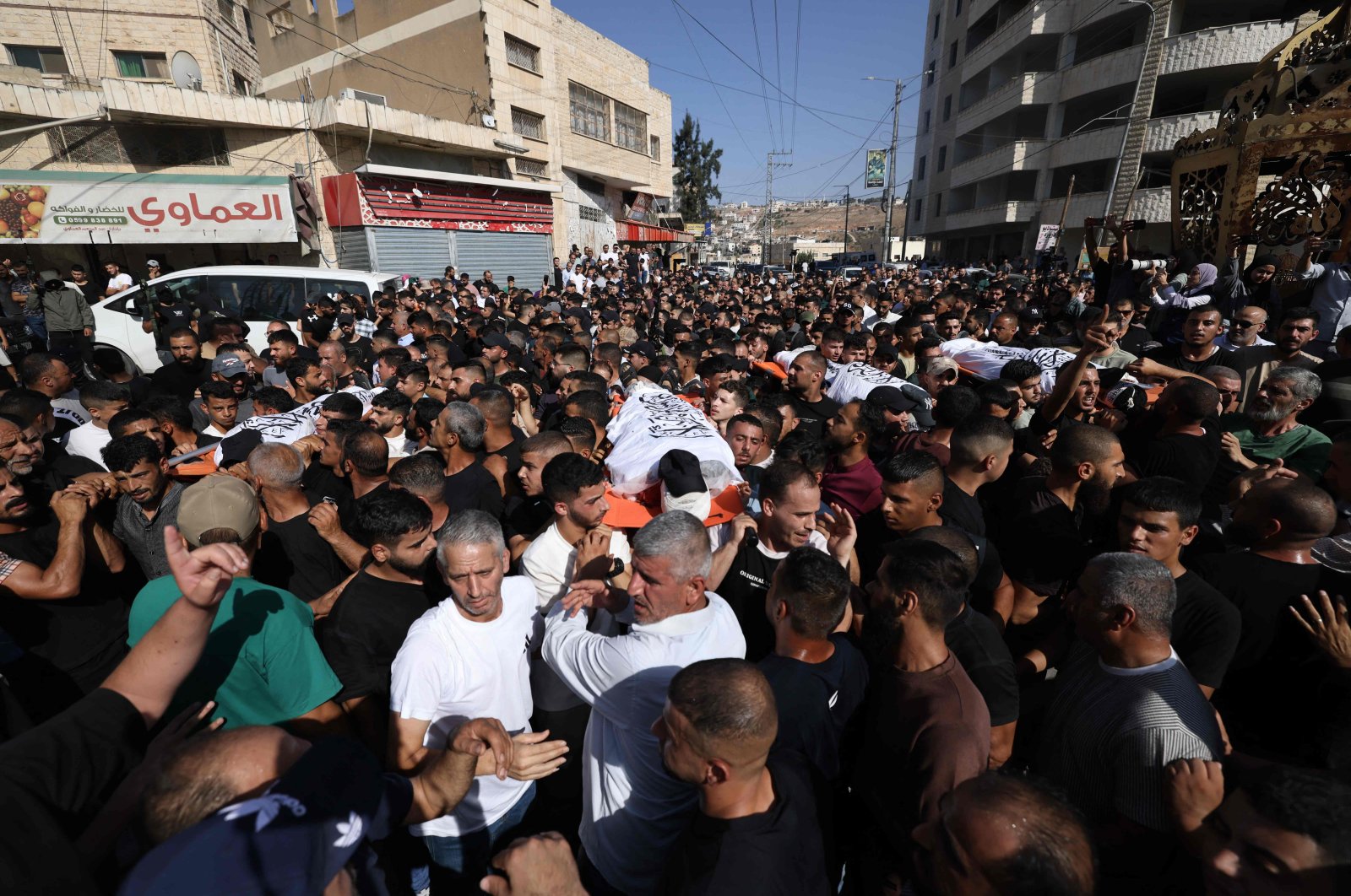 Palestinians take part in the funeral procession of men killed in an Israeli air strike in the Tubas, amid an ongoing military raid in the northern occupied West Bank, Palestine, Sept. 13, 2024. (AFP Photo)