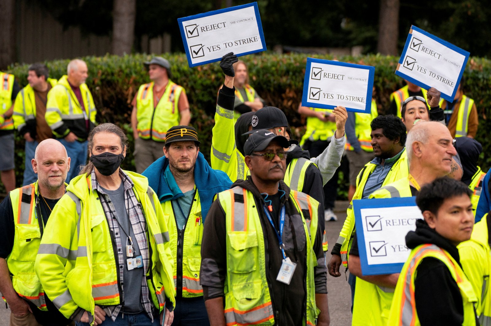 Boeing factory workers hold signs as they wait to vote on their first full contract in 16 years at an International Association of Machinists and Aerospace Workers District 751 union hall in Renton, Washington, U.S. Sept. 12, 2024. (Reuters Photo)