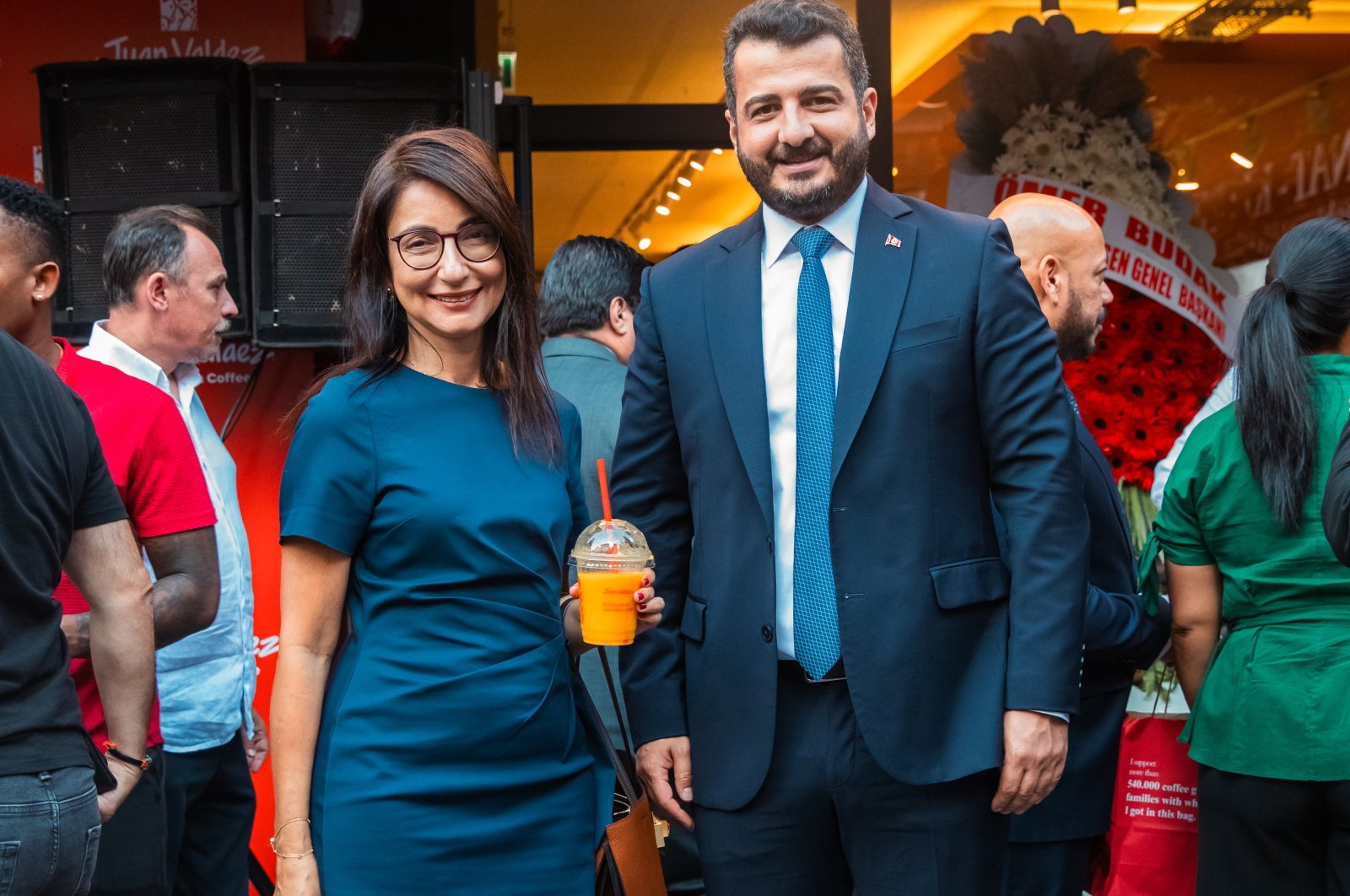 Juan Valdez, representing Colombia’s renowned coffee brand, joins Büyükelçi Yaprak Balkan (L) and Cengiz Deveci for the opening of their new store in Ankara’s Kızılay district. (Courtesy of Juan Valdez)