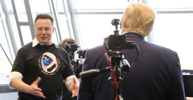 Then U.S. President Donald Trump and Elon Musk tour the Firing Room Four after the launch of a SpaceX Falcon 9 rocket and Crew Dragon spacecraft on NASA&#039;s SpaceX Demo-2 mission to the International Space Station from NASA&#039;s Kennedy Space Center in Cape Canaveral, Florida, U.S. May 30, 2020. (Reuters Photo)