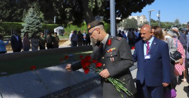 People lay flowers at Baku Turkish Martyrs Cemetery, Baku, Azerbaijan, Sept. 15, 2024. (AA Photo)