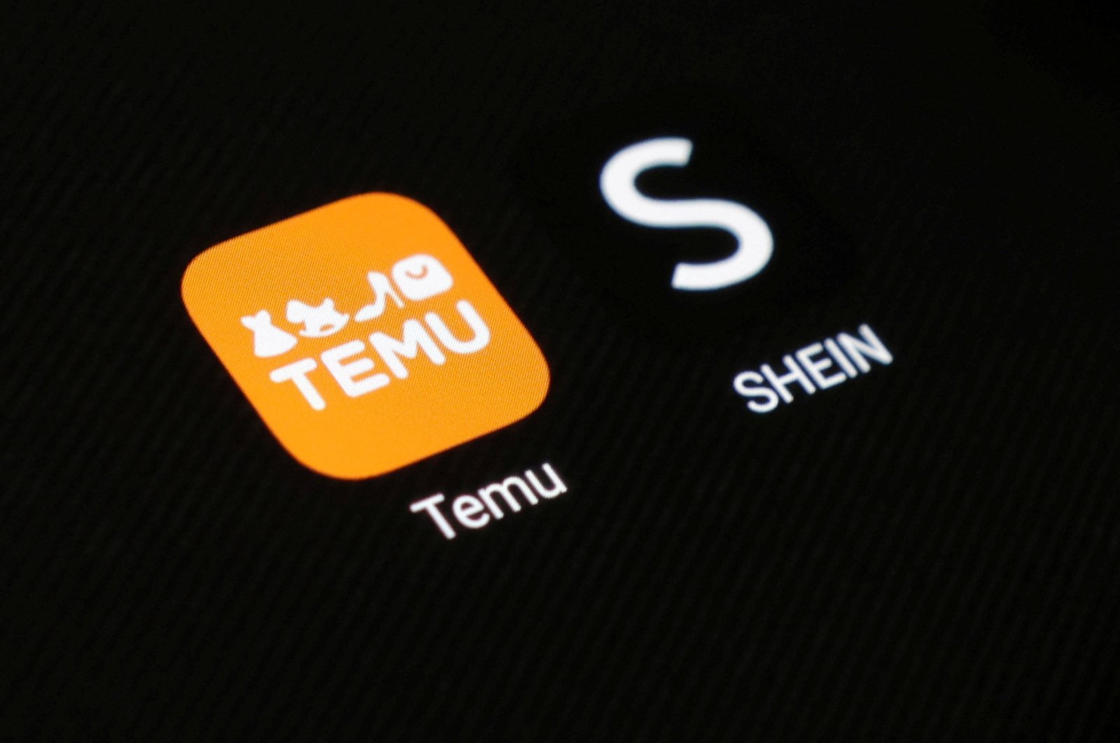 Shein and Temu app icons are seen in this illustration taken Aug. 22, 2024. (Reuters Photo)