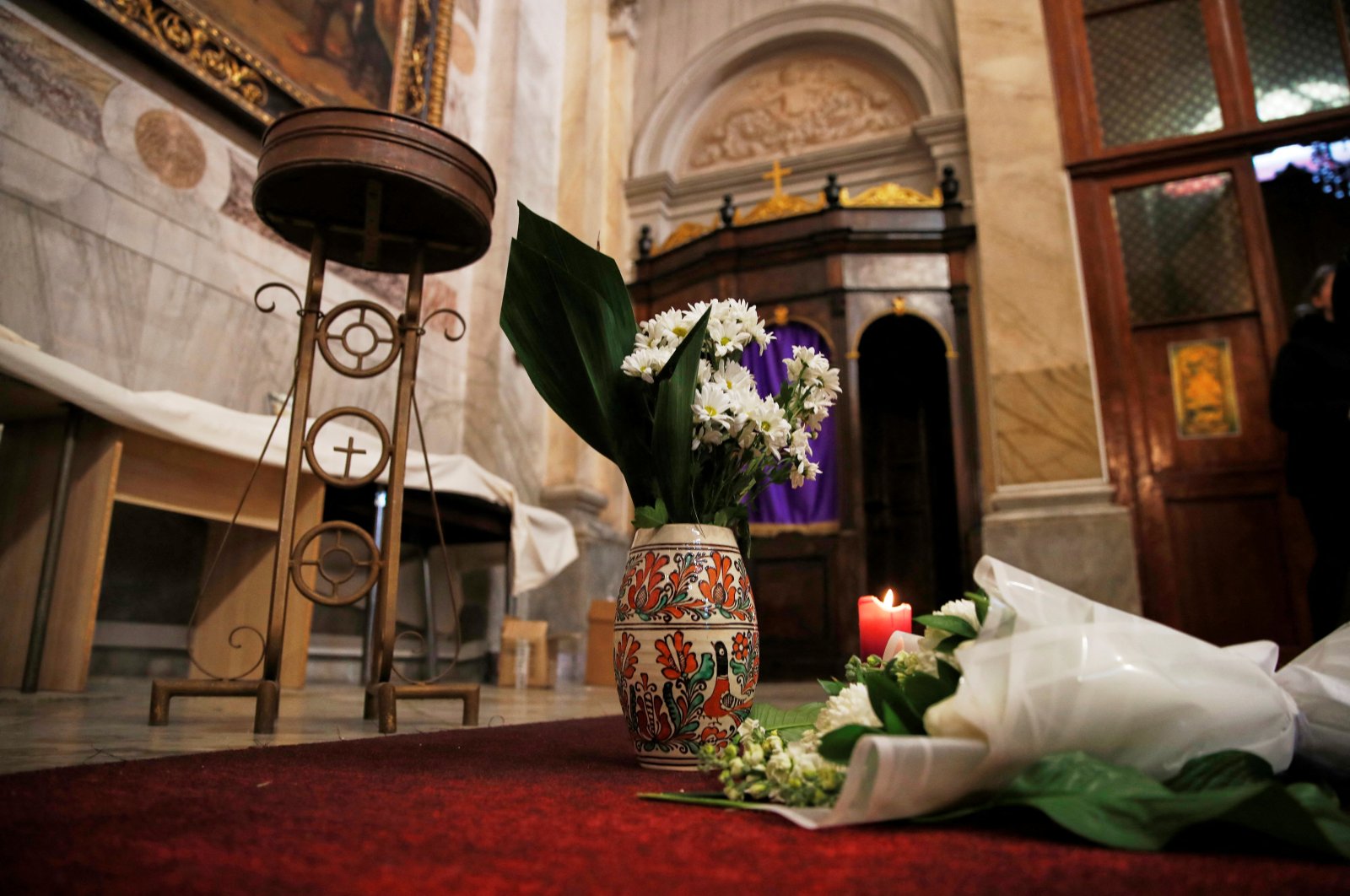 Flowers are placed inside the Italian Santa Maria Catholic Church a day after the Daesh attack in Istanbul, Türkiye, Jan. 29, 2024. (Reuters Photo)