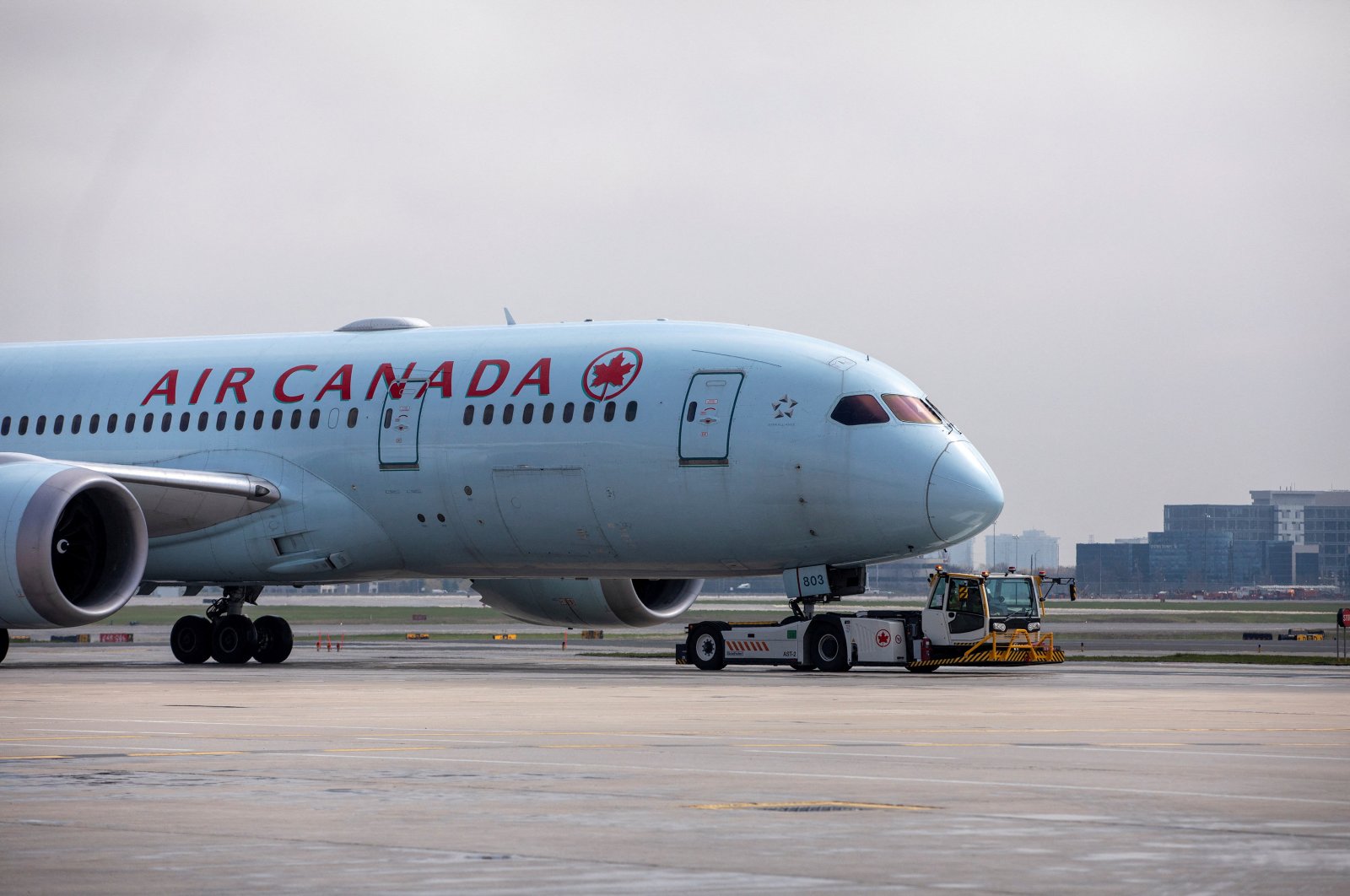 An Air Canada airplane is towed along a runway at Toronto Pearson Airport in Mississauga, Ontario, Canada, April 28, 2021. (Reuters Photo)