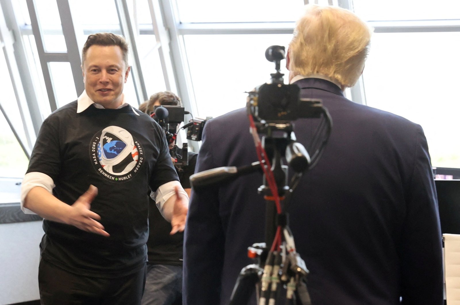 Then U.S. President Donald Trump and Elon Musk tour the Firing Room Four after the launch of a SpaceX Falcon 9 rocket and Crew Dragon spacecraft on NASA&#039;s SpaceX Demo-2 mission to the International Space Station from NASA&#039;s Kennedy Space Center in Cape Canaveral, Florida, U.S. May 30, 2020. (Reuters Photo)