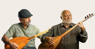 Turgay Salim and Musa Eroğlu play Turkish traditional instruments. (Courtesy of Turgay Salim and Musa Eroğlu)