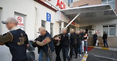 Suspects detained as part of an investigation into Mossad&#039;s activities in Türkiye escorted by police to undergo routine medical checks, Istanbul, Türkiye, Jan. 4, 2024. (AA Photo)