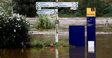 Road signs stand amid the floodwater from the swollen Elbe River, Saxony, Germany, Sept. 16, 2024. (EPA Photo)