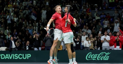 Serbia&#039;s Novak Djokovic (R) and Hamad Medjedovic celebrate after winning against Greece&#039;s Petros Tsitsipas and Aristotelis Thanos during the group stage men&#039;s doubles match between Serbia and Greece of the Davis Cup tennis tournament at the Aleksandar Nikolic Hall, Belgrade, Serbia, Sept. 15, 2024. (AFP Photo)