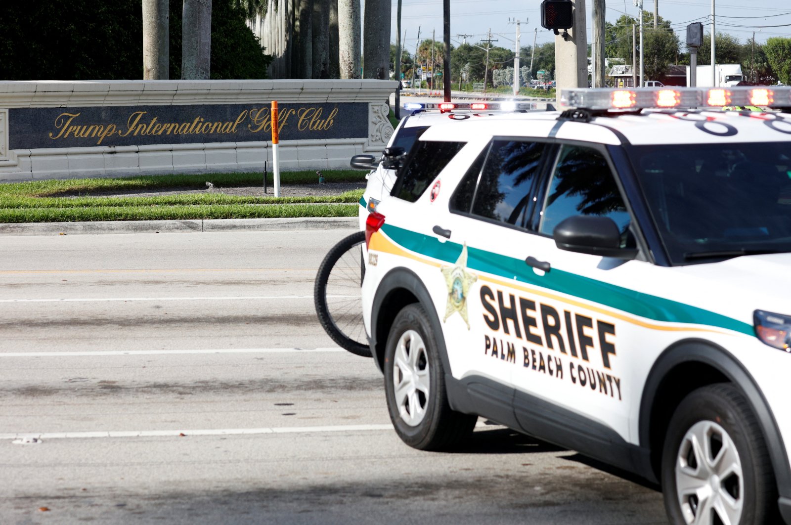 Law enforcement vehicles are parked after reports of shots fired outside Republican presidential nominee and former U.S. President Donald Trump&#039;s Trump International Golf Course in West Palm Beach, Florida, U.S., Sept. 15, 2024. (Reuters Photo)