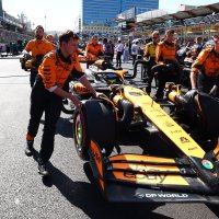 Mechanics push the car of Australian driver Oscar Piastri of the McLaren F1 Team during the 2024 Formula One Grand Prix of Azerbaijan, at the Baku City Circuit, Baku, Azerbaijan, Sept. 15, 2024. (EPA Photo)