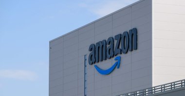 This photograph shows the logo of U.S. multinational company Amazon displayed on the facade of the distribution center in Augny, near Metz, France, Aug. 29, 2024. (AFP Photo)