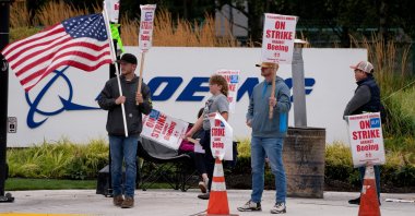 Boeing factory workers and supporters gather on a picket line during the third day of a strike near the entrance to a Boeing production facility in Renton, Washington, U.S., Sept. 15, 2024. (Reuters Photo)