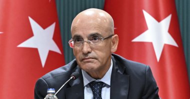 Treasury and Finance Minister Mehmet Şimşek speaks during a meeting to announce the government's updated medium-term program (MTP), Ankara, Türkiye, Sept. 5, 2024. (AA Photo)
