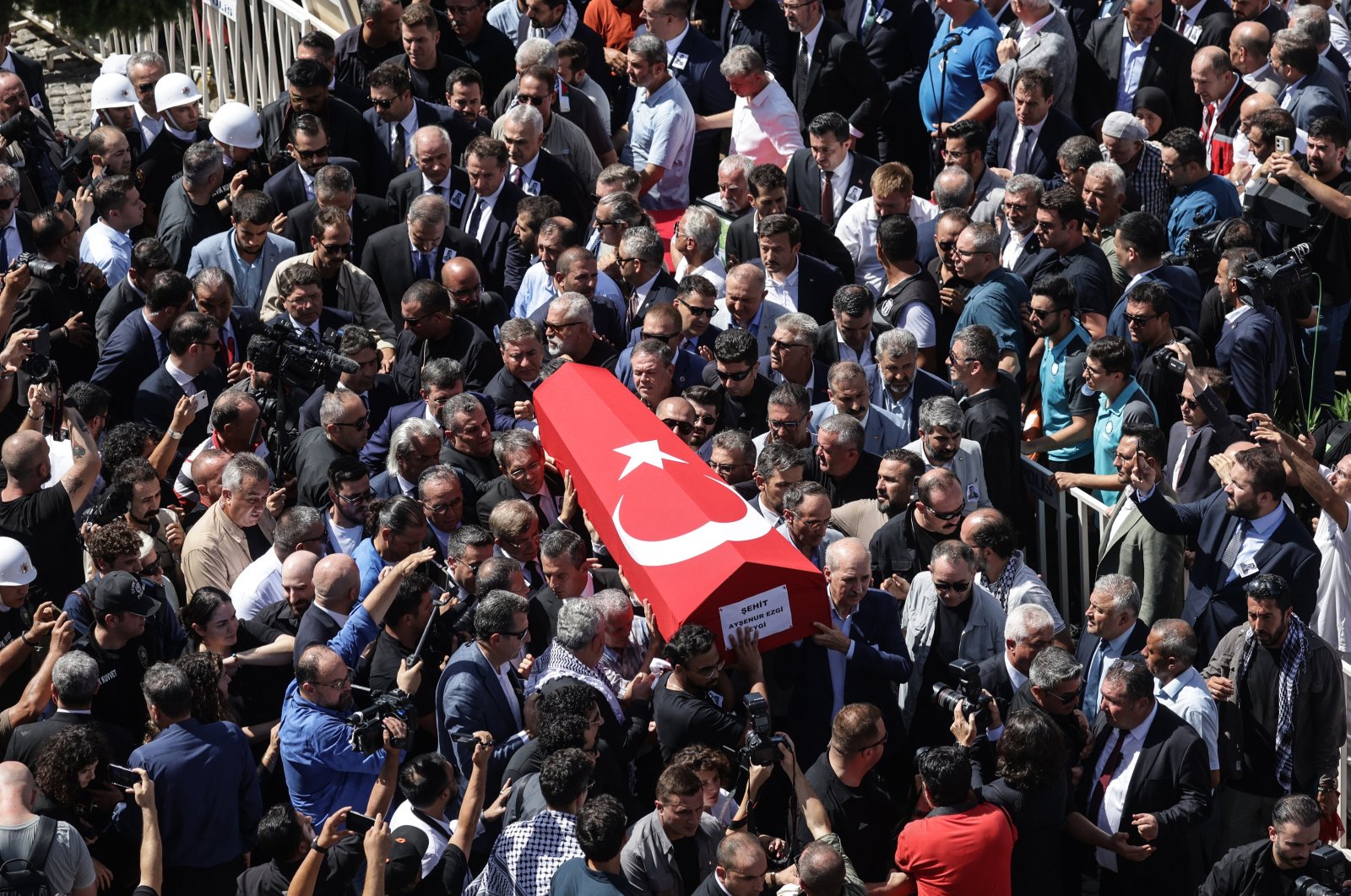 People carry the coffin of late Turkish American activist Ayşenur Ezgi Eygi during her funeral ceremony outside the Central Mosque, Didim district of Aydın, Türkiye, Sept. 14, 2024. (EPA Photo)