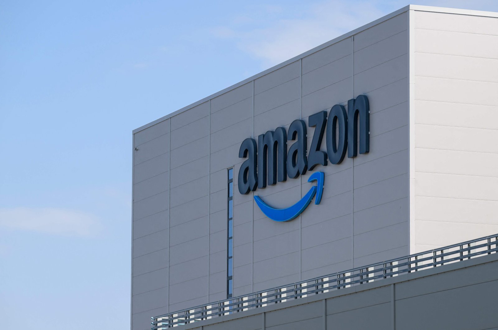 This photograph shows the logo of U.S. multinational company Amazon displayed on the facade of the distribution center in Augny, near Metz, France, Aug. 29, 2024. (AFP Photo)