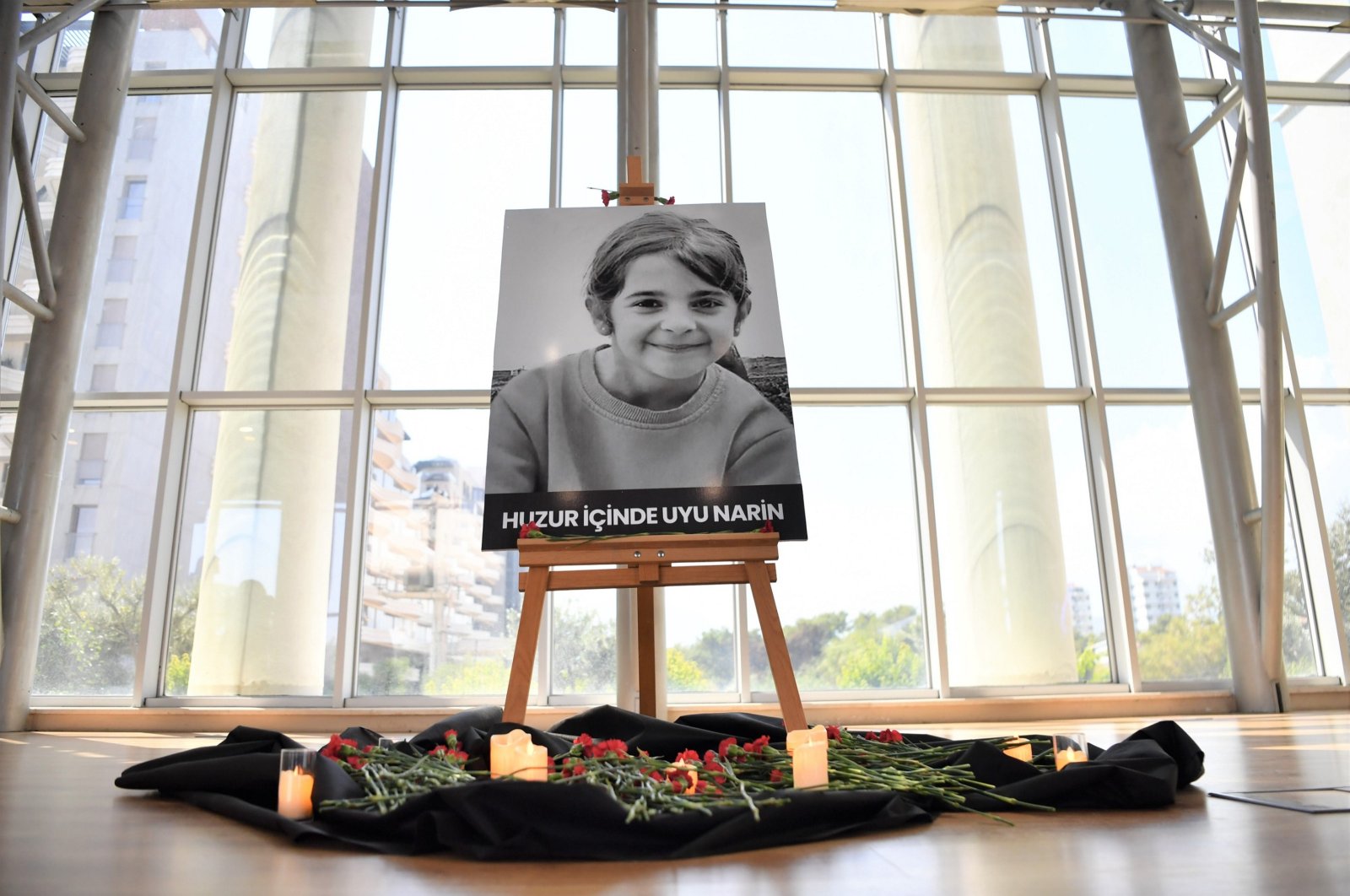 A photo of 8-year-old Narin Güran is displayed during a memorial ceremony in Antalya, Türkiye, Sept. 9, 2024. (AA Photo)