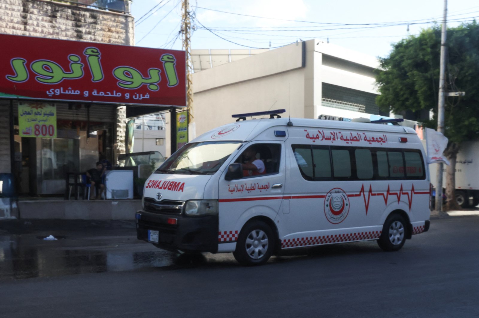 An ambulance vehicle drives as hundreds of members of the Lebanese group Hezbollah were seriously wounded when the pagers they use to communicate exploded, in Sidon, Lebanon, Sept. 17, 2024. (Reuters Photo)