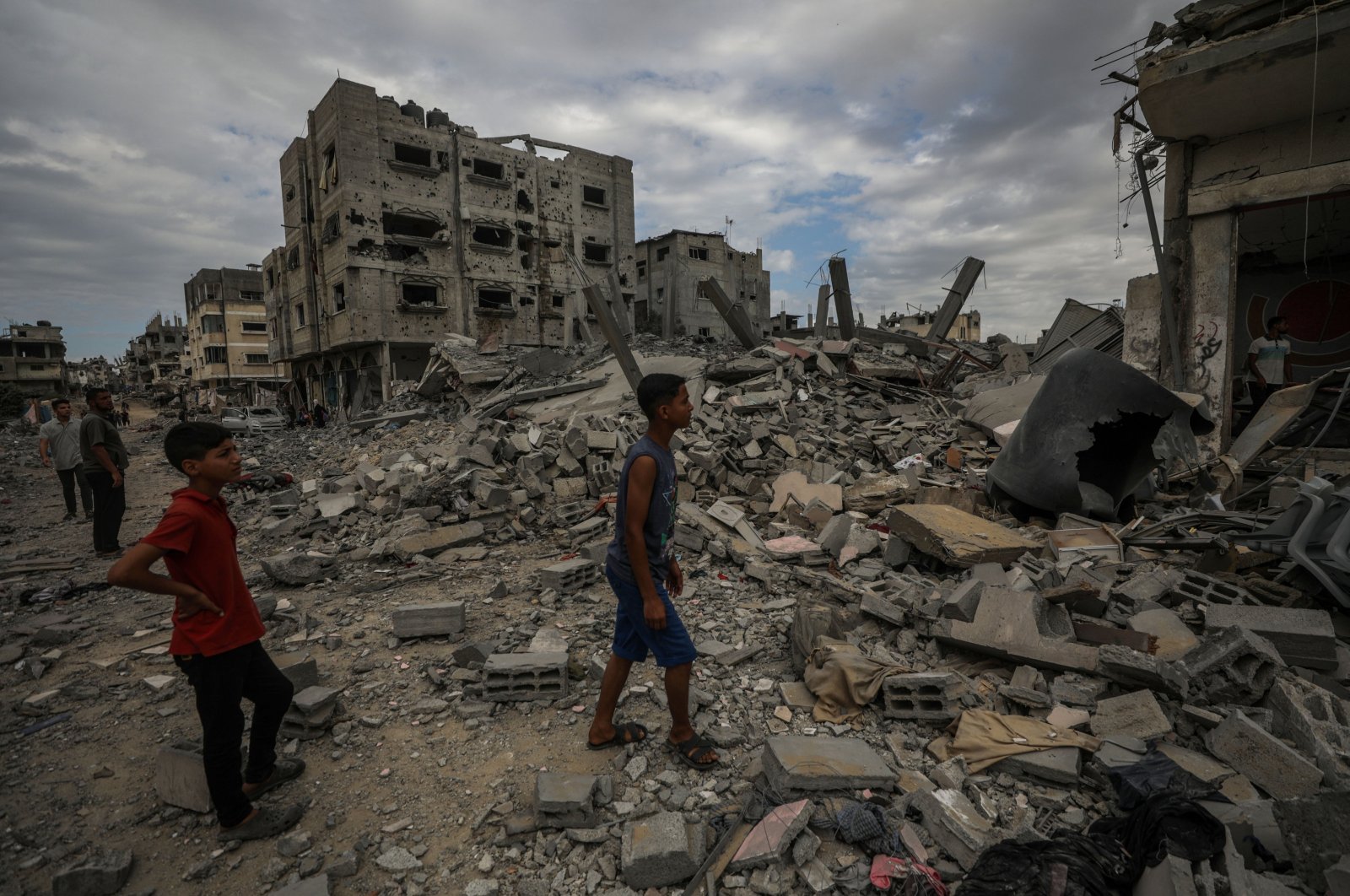 Palestinians search among the rubble of a destroyed house following Israeli airstrikes in the al-Bureij refugee camp in the southern Gaza Strip, Palestine, Sept. 17, 2024. (EPA Photo)