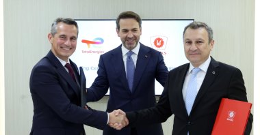 Energy and Natural Resources Minister Alparslan Bayraktar (C) and TotalEnergies and BOTAŞ' officials attend the signing ceremony for the agreement, Houston, U.S., Sept. 18, 2024. (AA Photo)