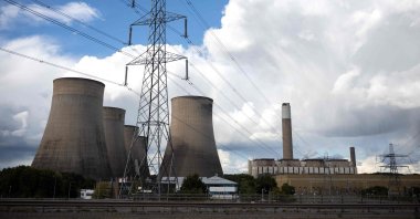 Electricity pylons carry power cables above the Ratcliffe-on-Soar coal-fired power station, which is due to close at the end of the month, is pictured near Nottingham, U.K., Sept. 12, 2024. (AFP Photo)