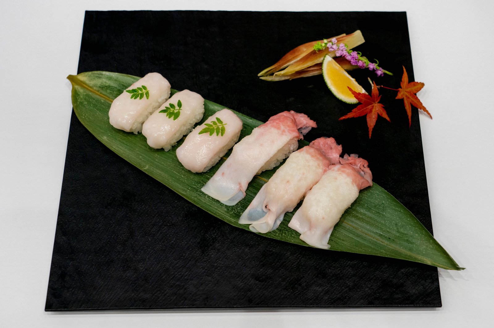 A plate of sushi made from raw fin whale meat is displayed at the exhibition at Tokyo&#039;s Toyosu market, Japan, Sept. 13, 2024. (AFP P hoto)