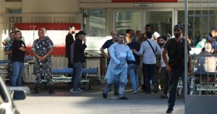 People gather outside a hospital as wounded are brought in after pagers were denotated across the country in Beirut, Lebanon, Sept. 17, 2024. (Reuters Photo)