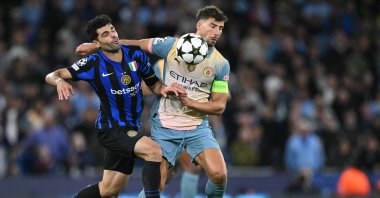 Inter Milan's Iranian forward Mehdi Taremi (L) vies with Manchester City's Portuguese defender Ruben Dias (R) during their UEFA Champions League match, in Manchester, U.K., Sept. 18, 2024 (AFP Photo)