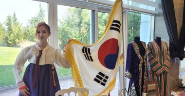 Representatives from South Korea exhibit their culture and traditional outfits at the Autumn Reunion with Culture and Fashion event, Ankara, Türkiye, Sept. 17, 2024. (Photo by Sena Darbaz)