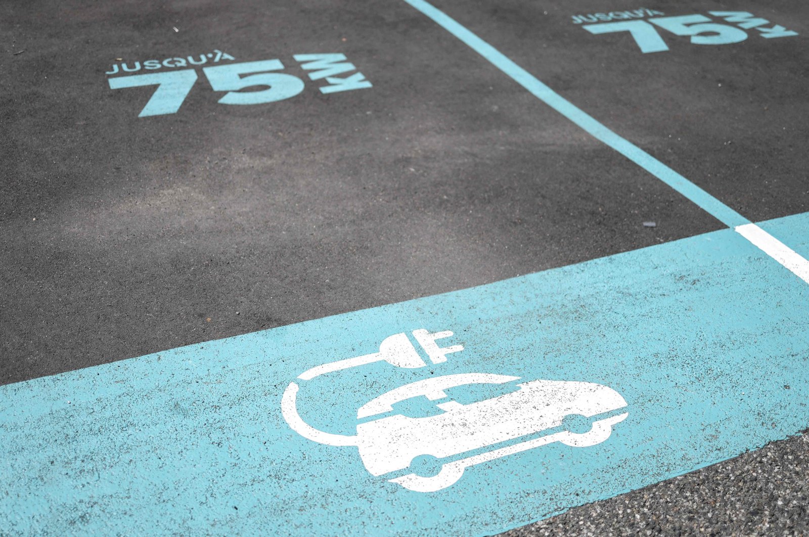 The parking space for an electric car charging station, Toulouse, France, July 17, 2023. (AFP Photo)