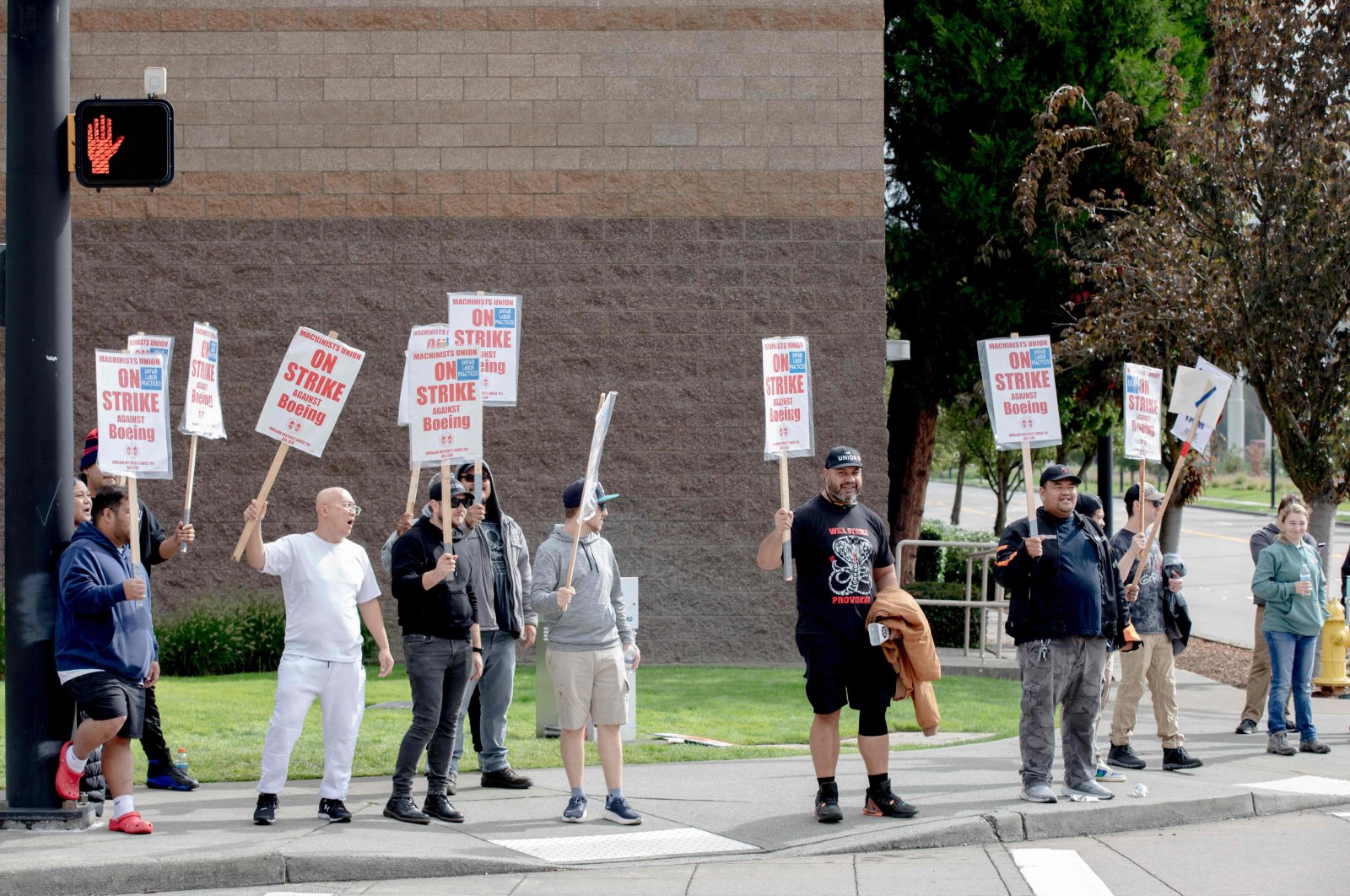 Striking Boeing workers and their supporters picket outside the Boeing Co. manufacturing facility in Renton, Washington, U.S., Sept. 16, 2024. (AFP Photo)