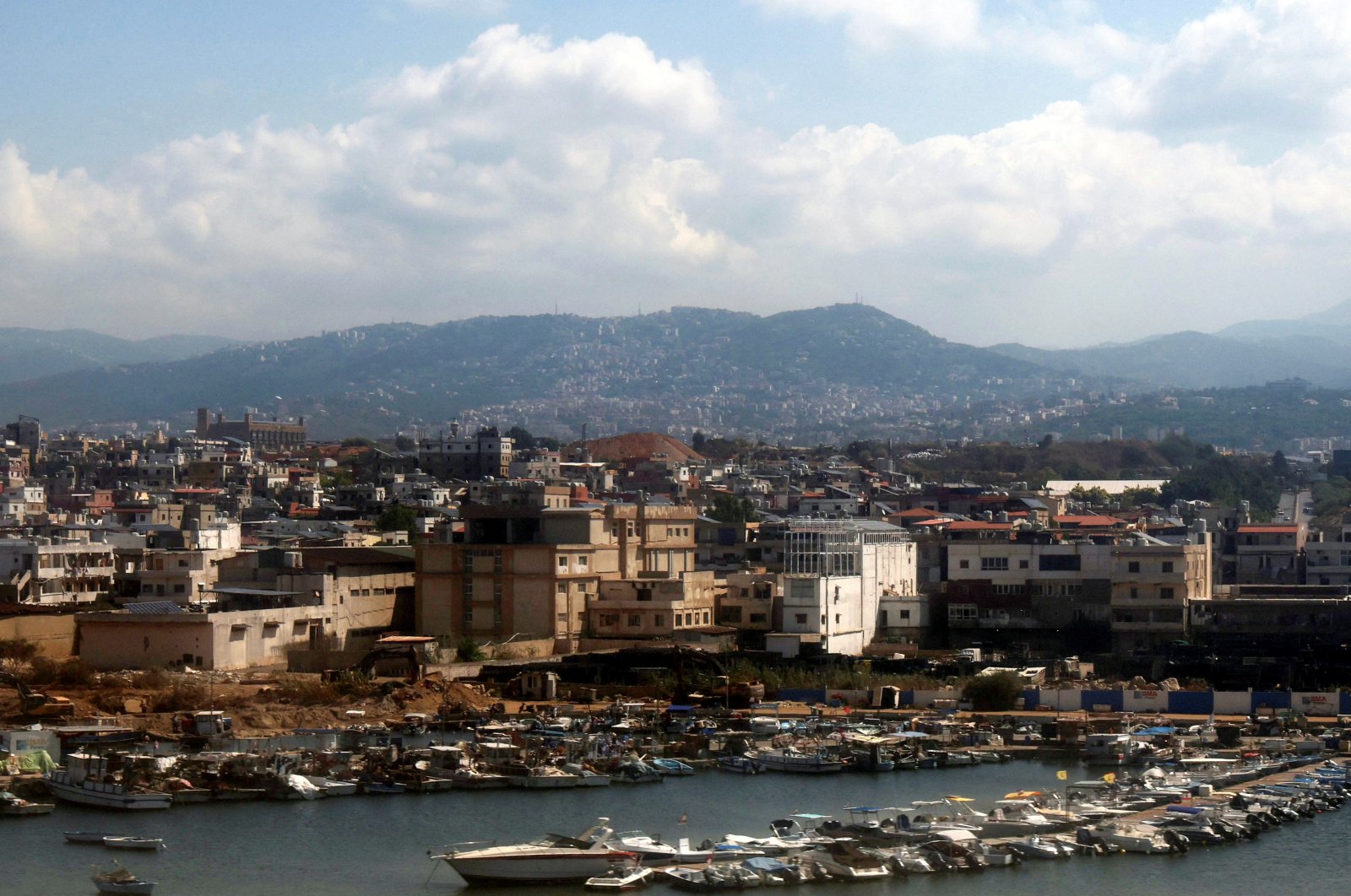 An aerial view from an airplane window shows the coast with boats parked at the Lebanese capital Beirut, a day after hand-held radios used the by Hezbollah detonated across Lebanon&#039;s south, Lebanon, Sept. 19, 2024. (Reuters Photo)