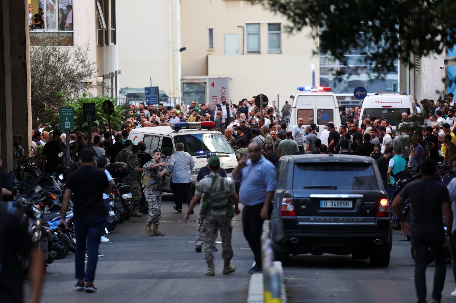 People gather outside a hospital as wounded are brought in after pagers were denotated across the country in Beirut, Lebanon, Sept. 17, 2024. (Reuters Photo)