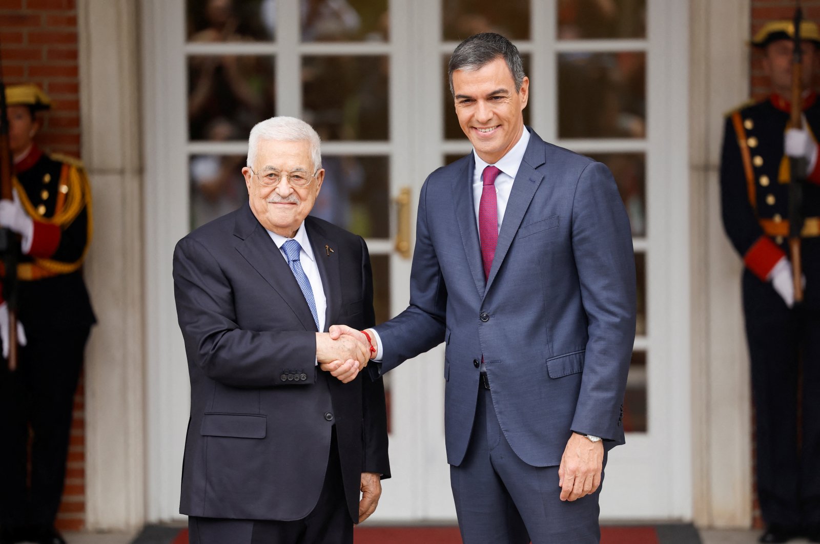 Spain&#039;s Prime Minister Pedro Sanchez shakes hands with Palestinian President Mahmoud Abbas at Moncloa Palace in Madrid, Spain, Sept. 19, 2024. (Reuters Photo)