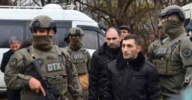 Armenian prisoners of war (POWs) are seen during a swap at the Azerbaijani-Armenian state border, Dec. 13, 2023. (AFP Photo)